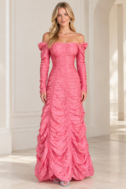 Front view of woman wearing pink off-the-shoulder ruched long sleeve evening maxi gown
