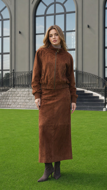 Front full view of woman wearing Cognac Brown faux suede bomber jacket and maxi skirt set