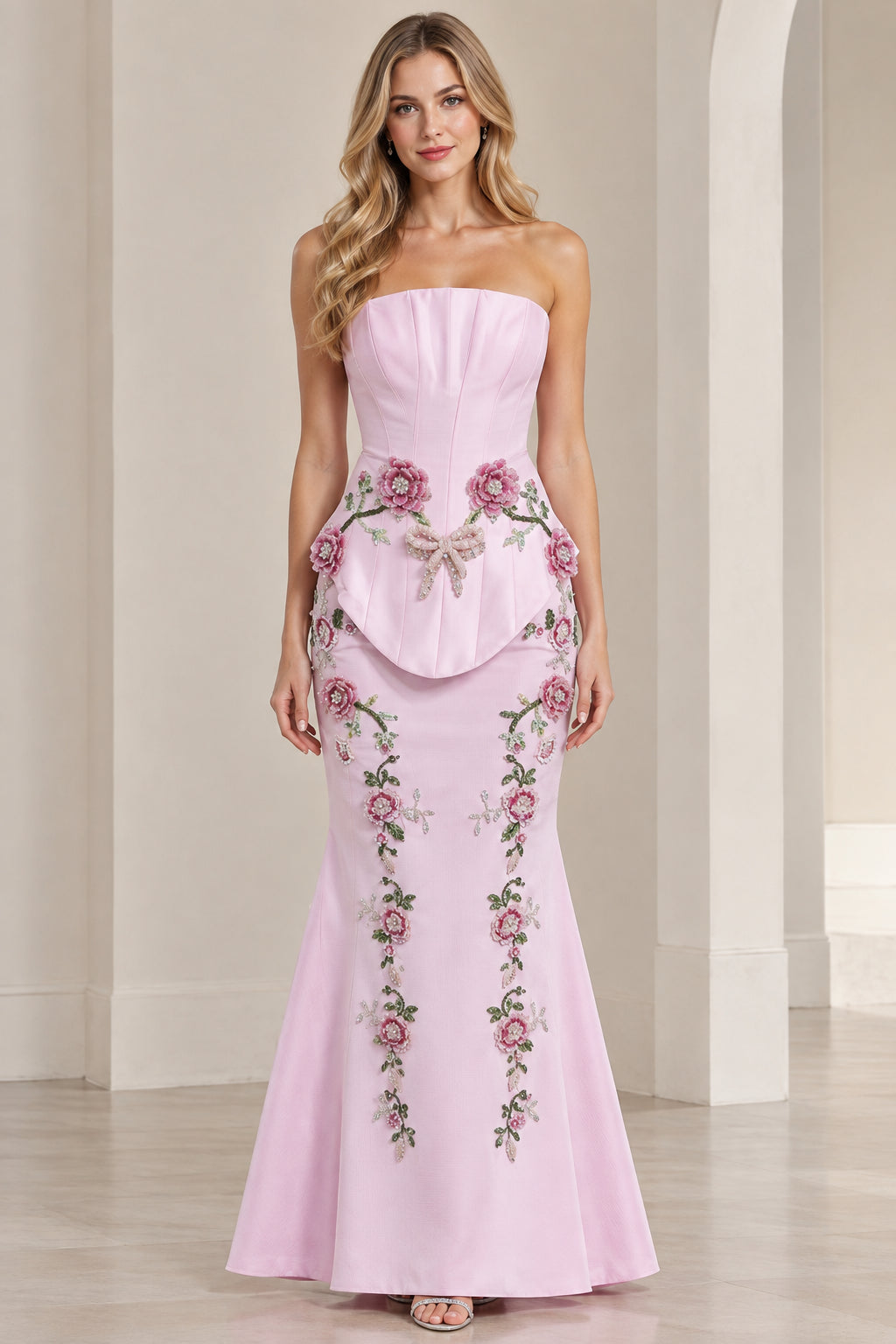 Front view of model wearing Light Pink strapless floral embroidered mermaid evening gown