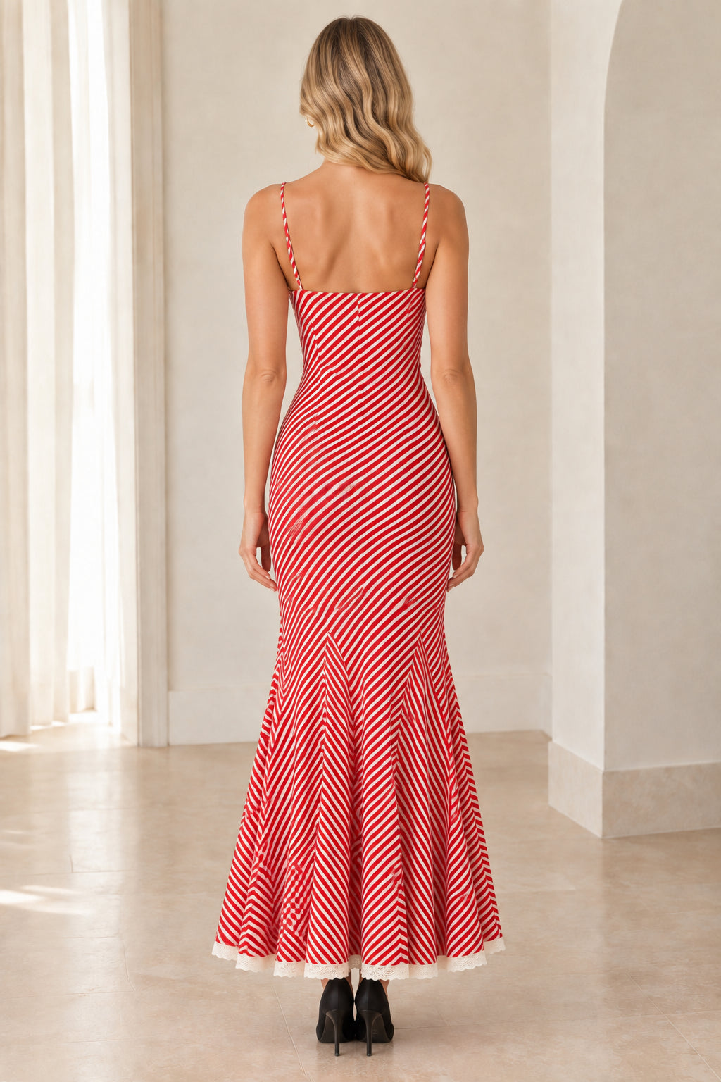 Back view of sleeveless red striped mermaid maxi dress