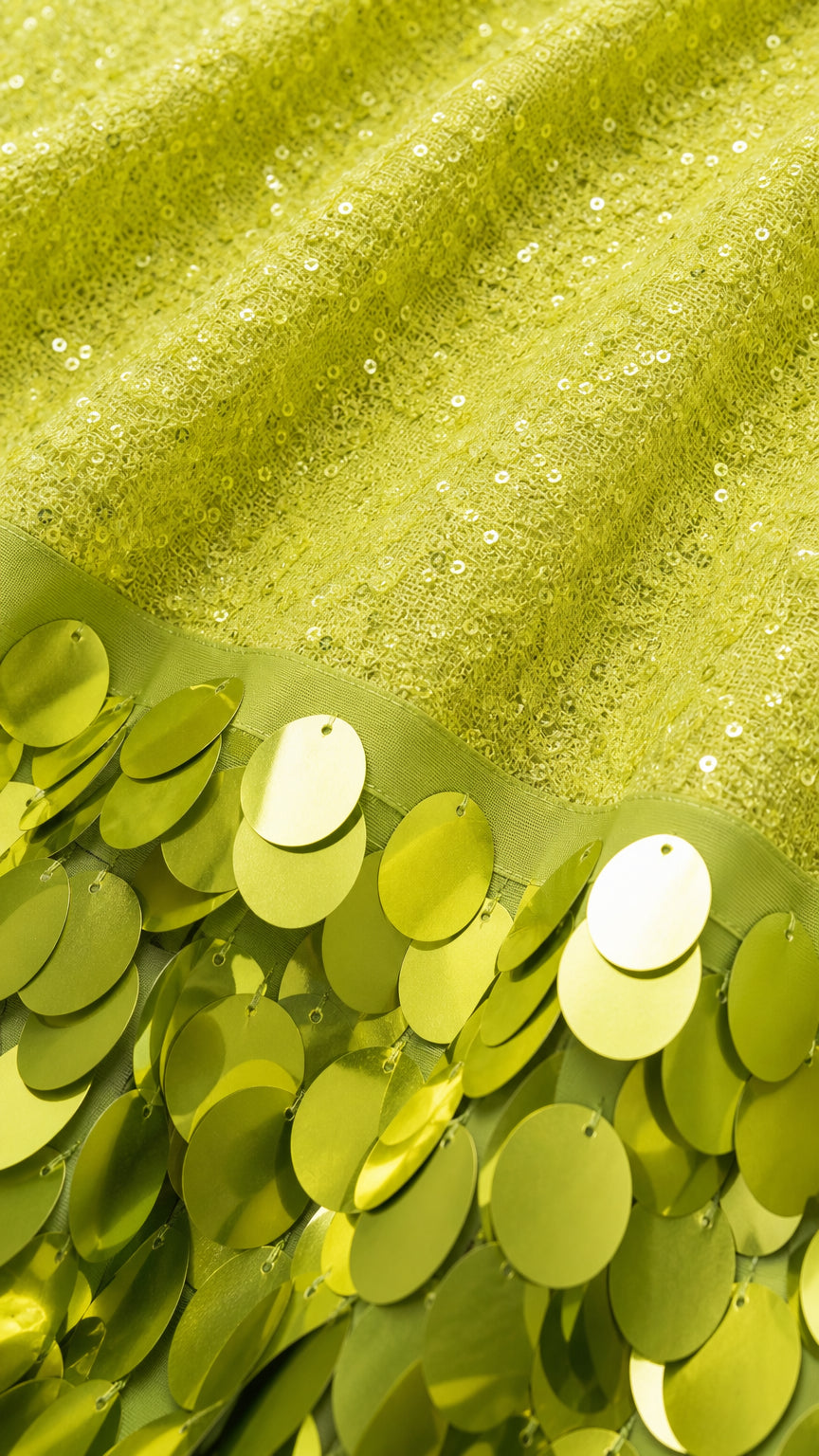 Close-up detail of lime green micro sequins and hanging coin paillettes