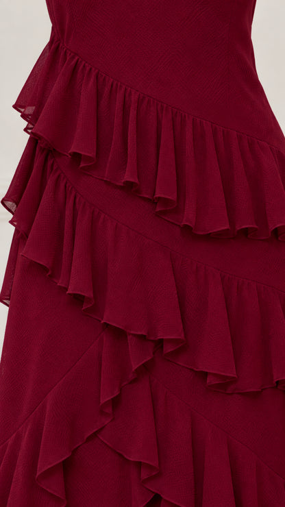Close-up detail of tiered chiffon ruffles in burgundy