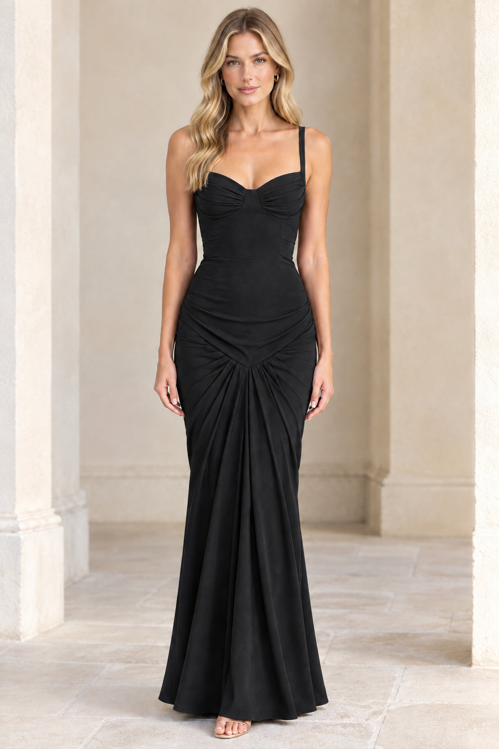 Front view of model wearing Black sweetheart ruched mermaid maxi dress