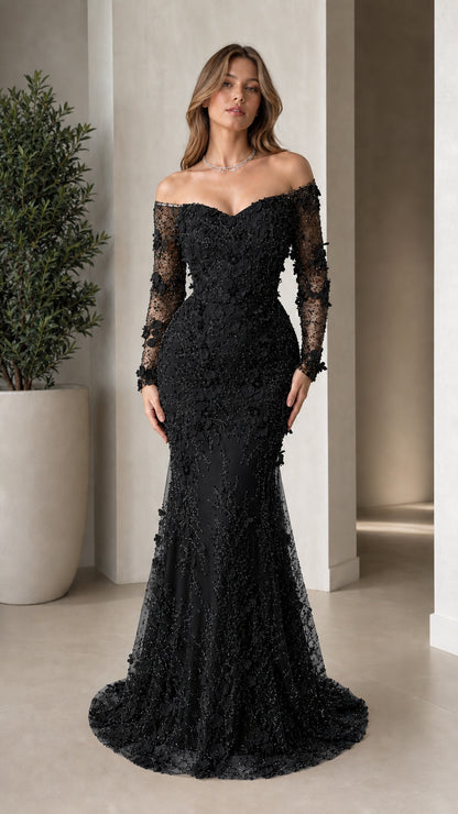 Front view of woman wearing black off-the-shoulder 3D floral mermaid gown