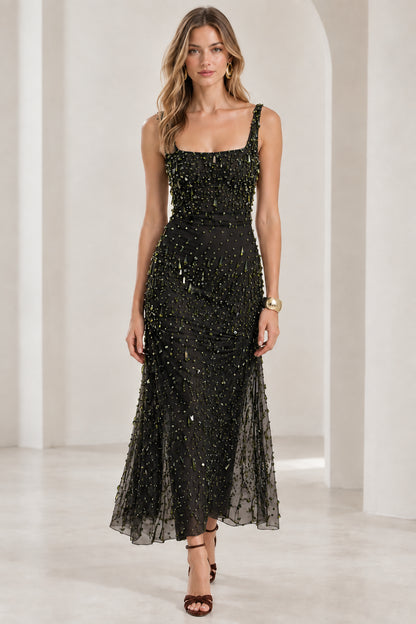 Front view of model wearing black beaded square neck maxi evening gown