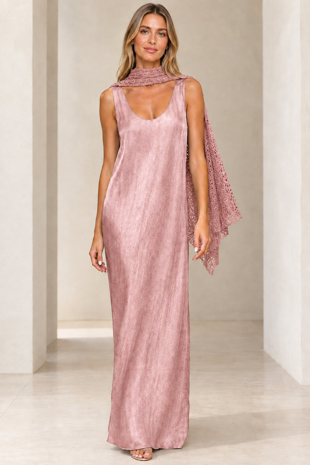 Front view of dusty pink shimmer sleeveless maxi dress with matching rose crochet scarf