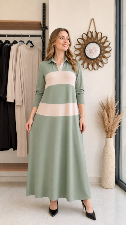 Woman wearing sage green and beige colorblock long sleeve polo maxi dress