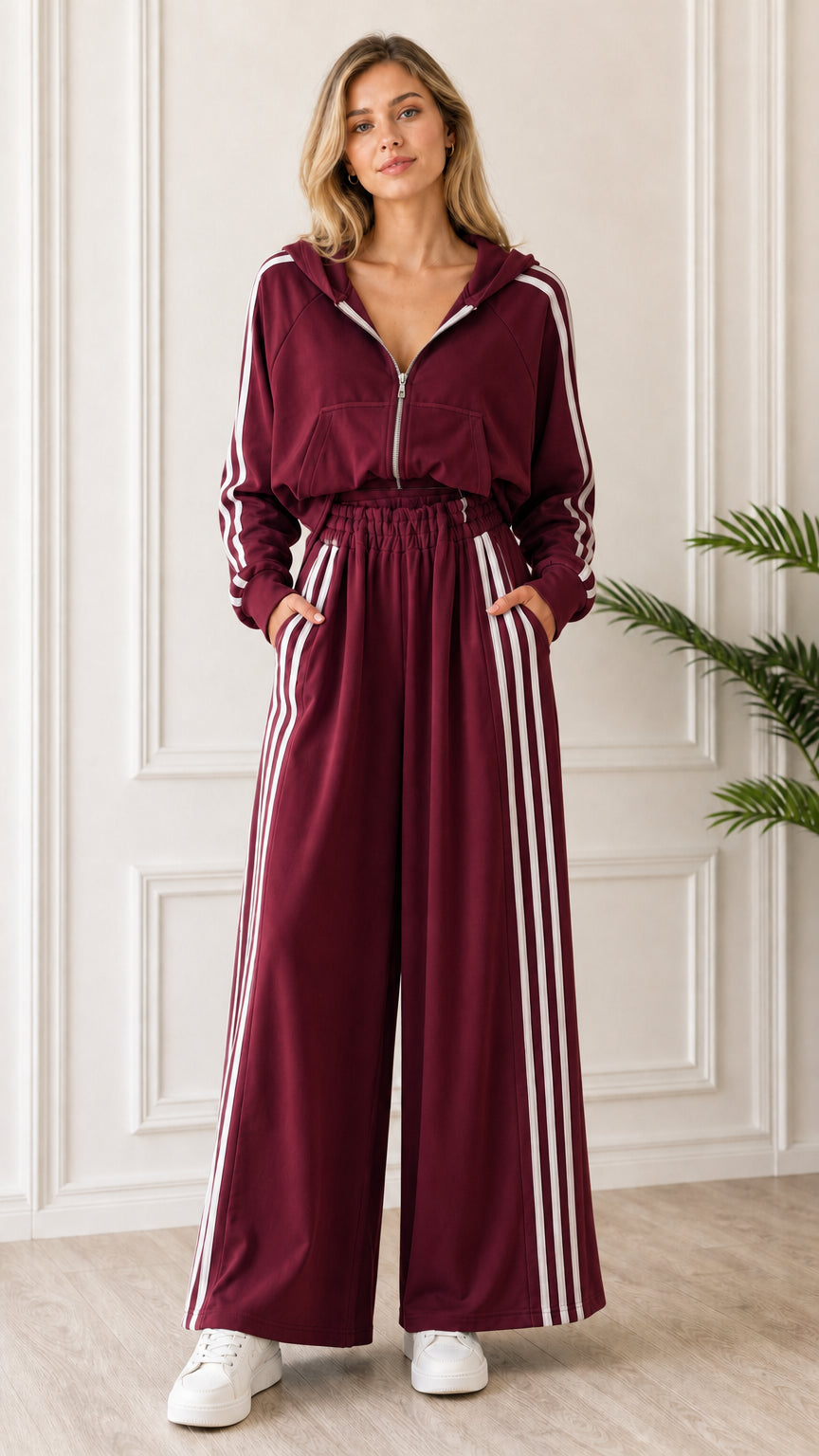 Full-length front view of woman wearing Burgundy 2-piece striped tracksuit set