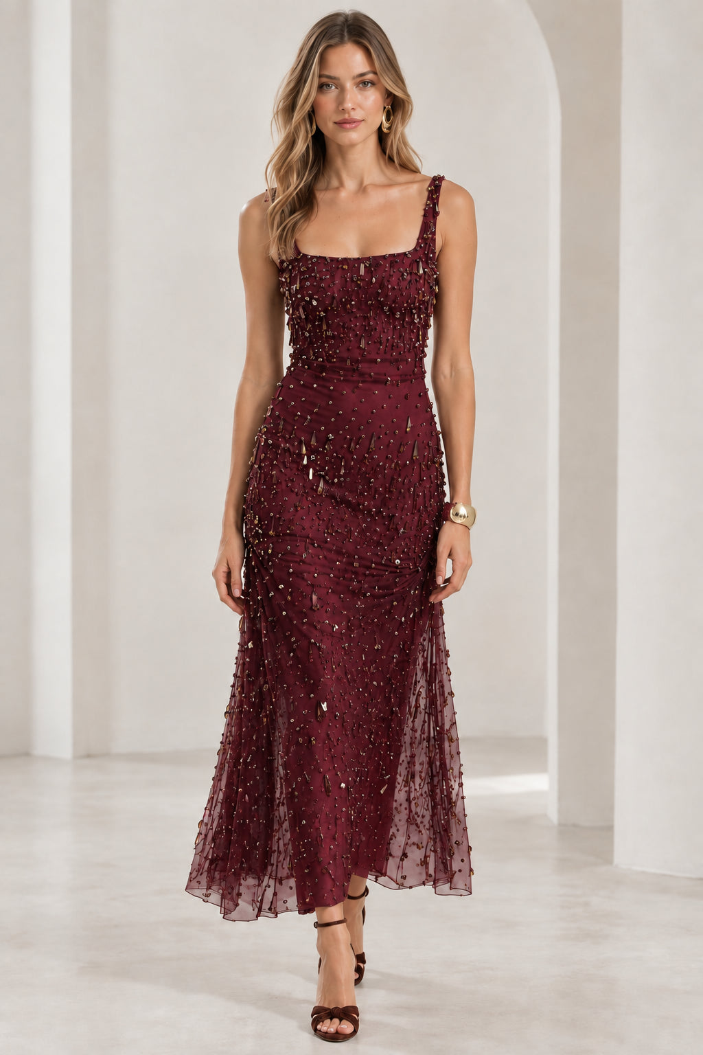 Front view of model wearing burgundy wine beaded maxi evening dress