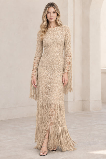 Model wearing champagne beige floral lace fringe maxi evening dress