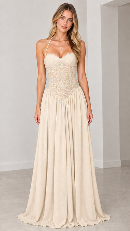 Front view of model wearing champagne beige halter maxi dress