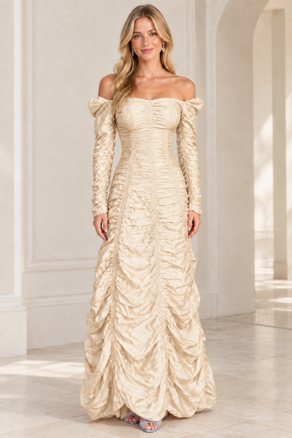 Front view of champagne gold off-the-shoulder ruched evening gown