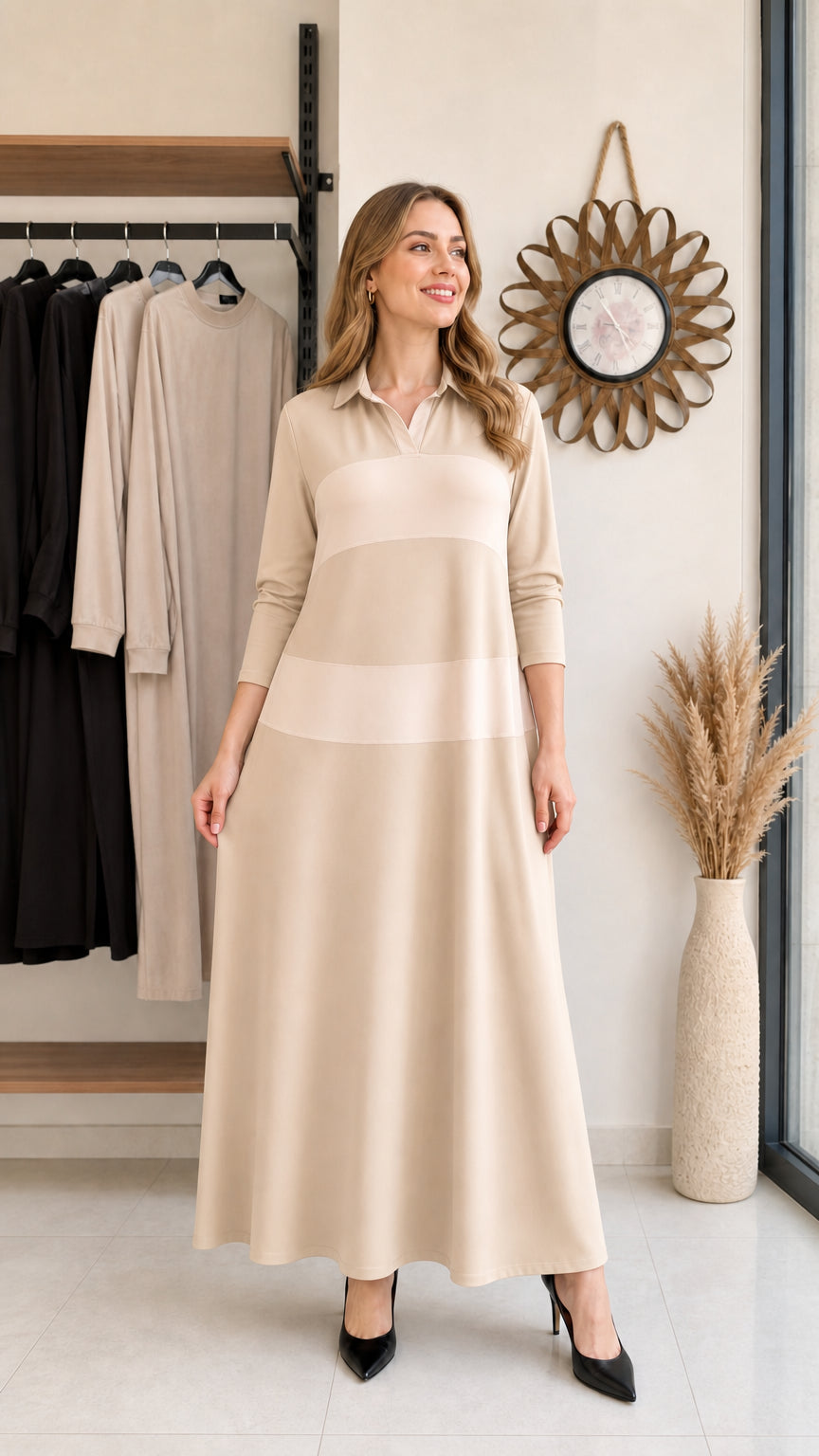 Woman wearing beige and light cream colorblock long sleeve polo maxi dress